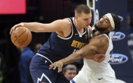 篮球-约基奇称霸低位进攻：华丽球风掩盖下他捍卫传统